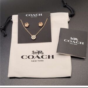COACH Open Circle Necklace And Tea
Rose Stud Earrings Set